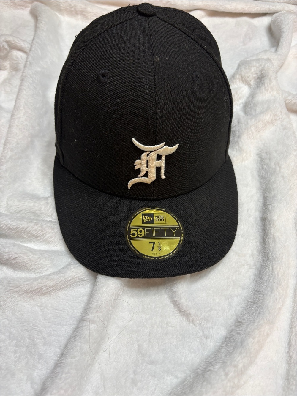 New Era Black Fitted Cap with White Script Logo